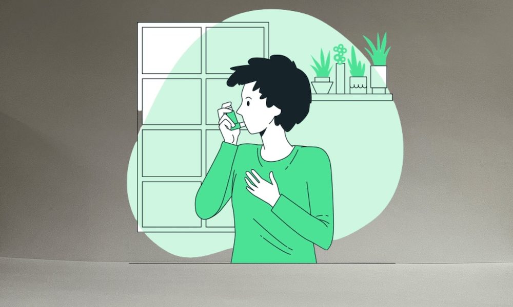 a man with inhaler taking dose